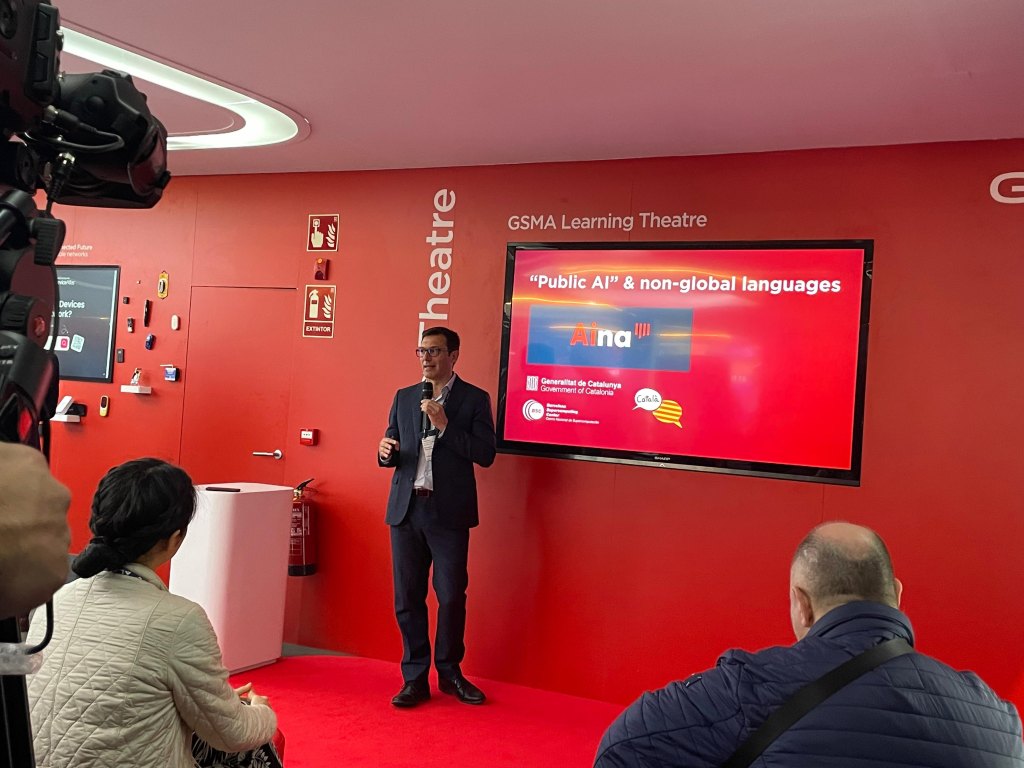 Presentació sobre la IA pública a l'estand de la GSMA